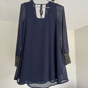 Boutique dress. Navy blue mini dress with gold design on sleeves